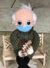 Тази кукла за плетене на една кука "Бърни ръкавици" току-що продадена за 20 300 долара в eBay